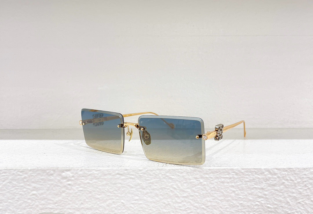 Blaue, braune, schwarze und rosa Sonnenbrille