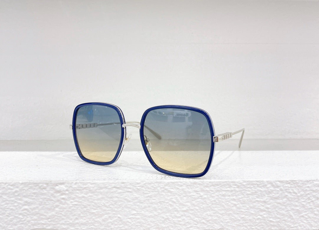 Rosa, braune und schwarze Sonnenbrille