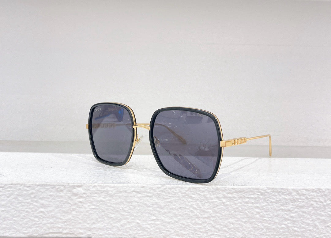 Rosa, braune und schwarze Sonnenbrille