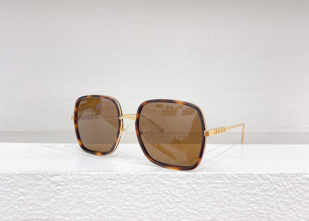 Rosa, braune und schwarze Sonnenbrille