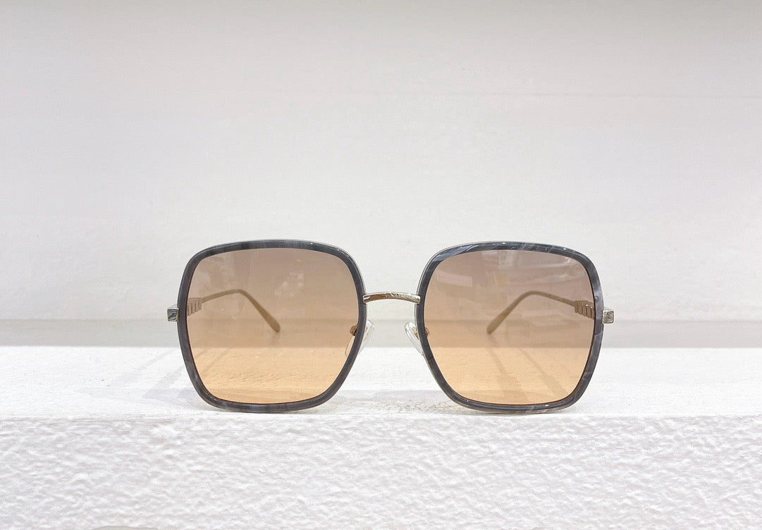 Rosa, braune und schwarze Sonnenbrille