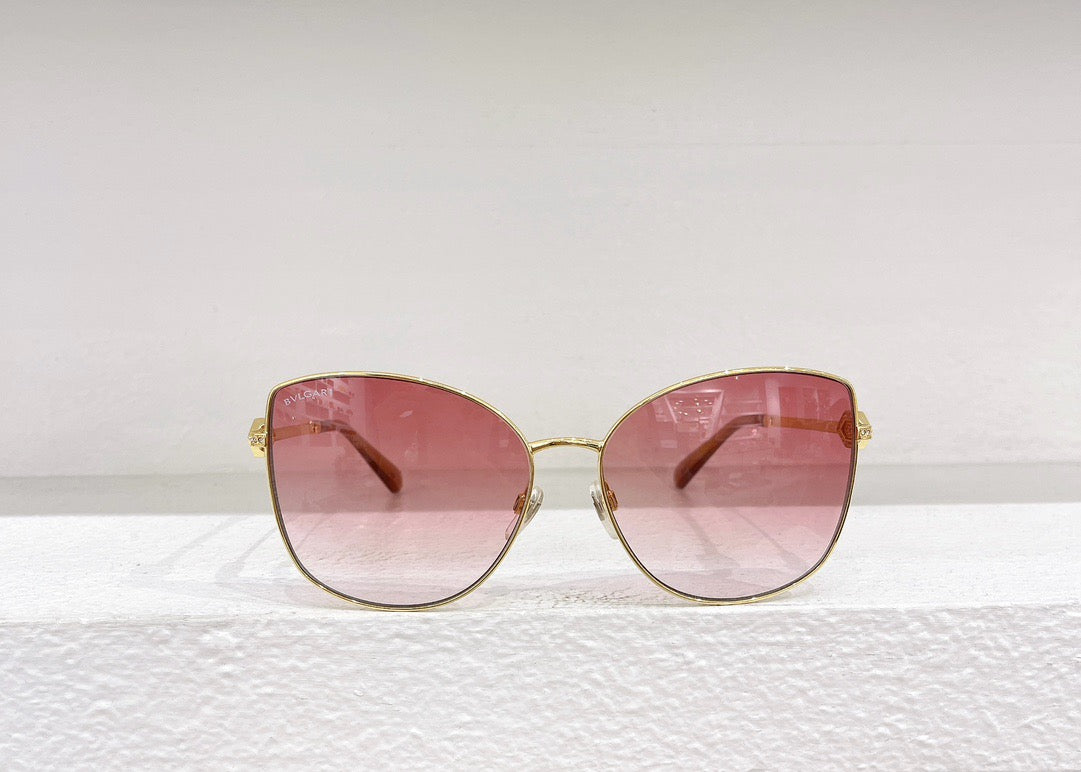 Blaue, braune und rosa Sonnenbrille