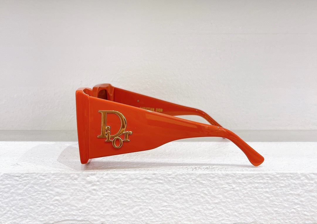Sonnenbrille in Rot, Grün, Weiß, Schwarz und Orange