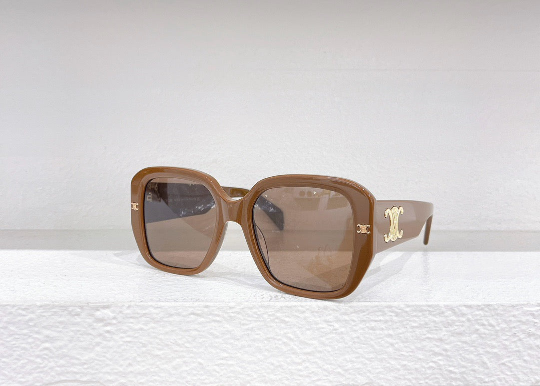 Braune, blaue und schwarze Sonnenbrille