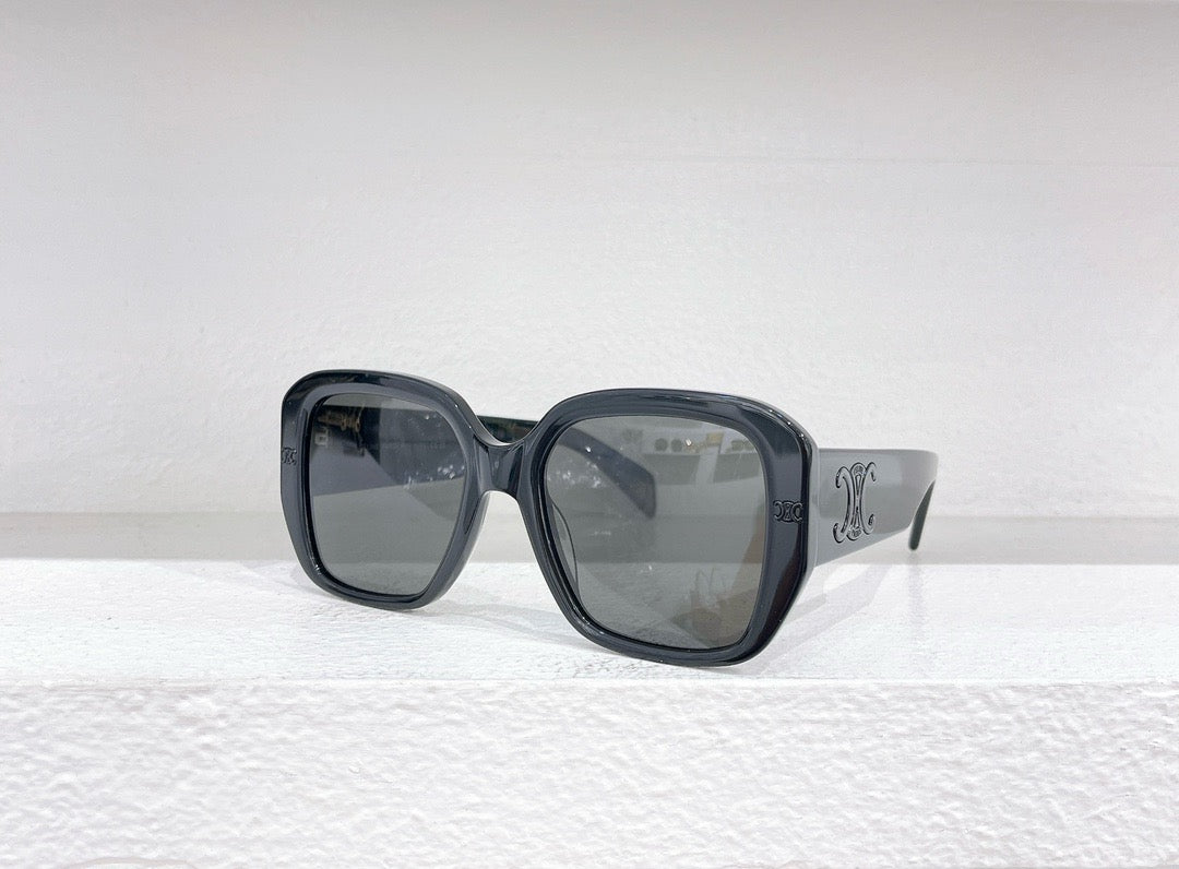 Braune, blaue und schwarze Sonnenbrille