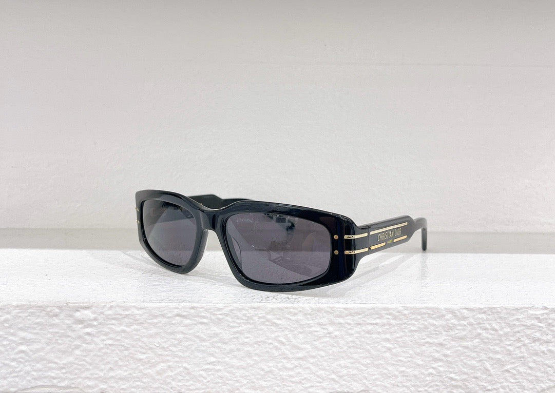 Schwarze, grüne und braune Sonnenbrille