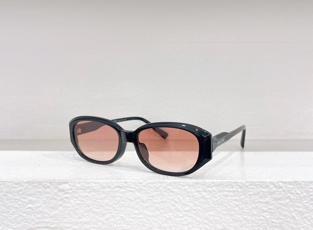 Schwarze, weiße und braune Sonnenbrille