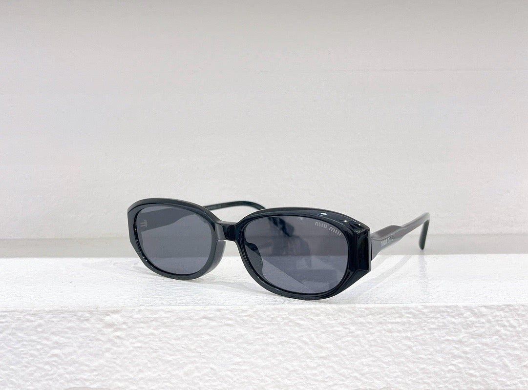 Schwarze, weiße und braune Sonnenbrille