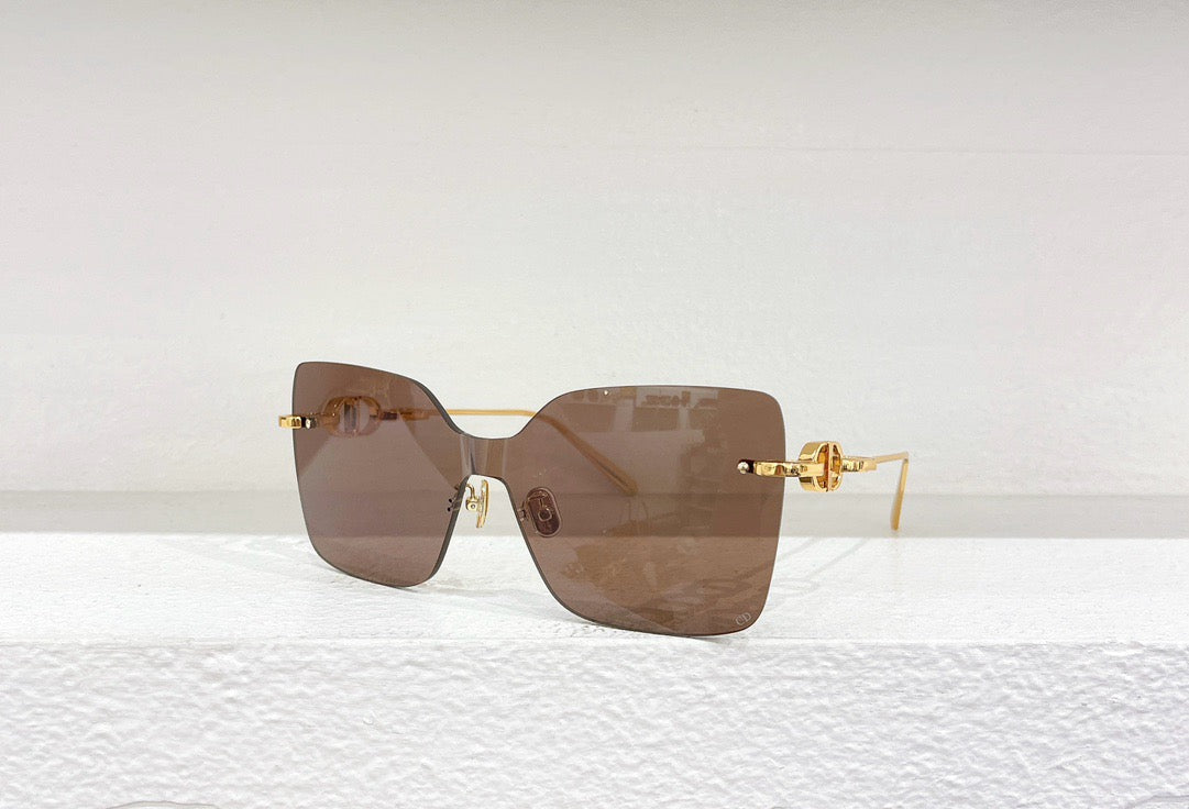 Blaue, braune, schwarze und rosa Sonnenbrille