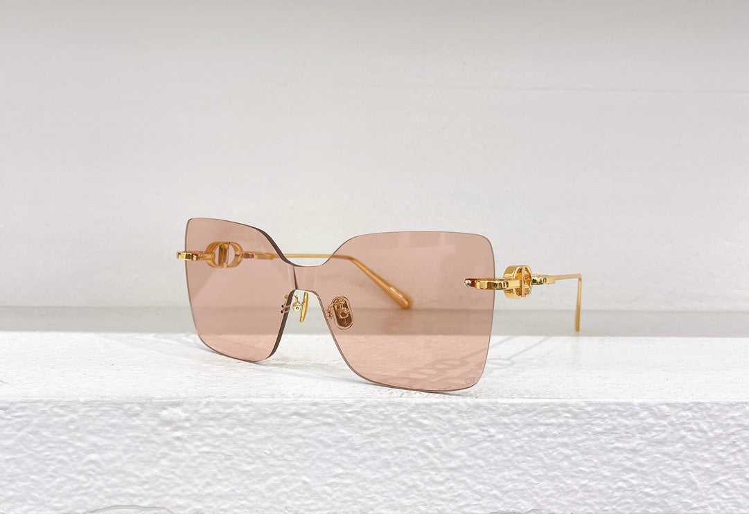 Blaue, braune, schwarze und rosa Sonnenbrille