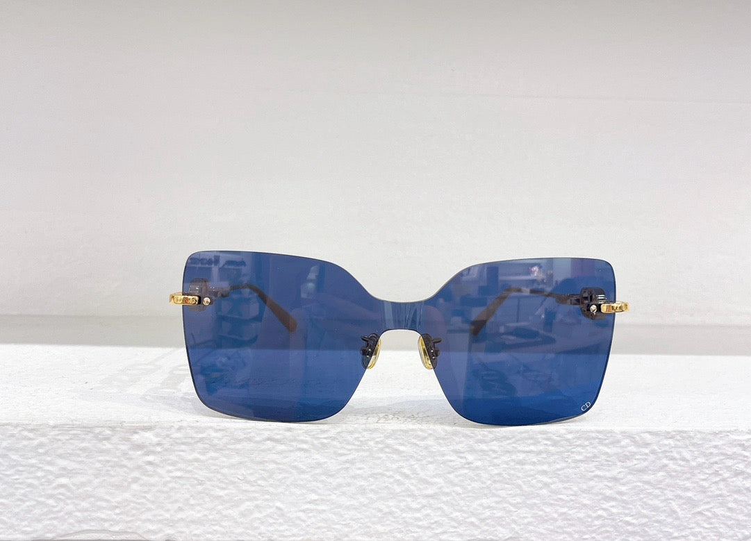 Blaue, braune, schwarze und rosa Sonnenbrille