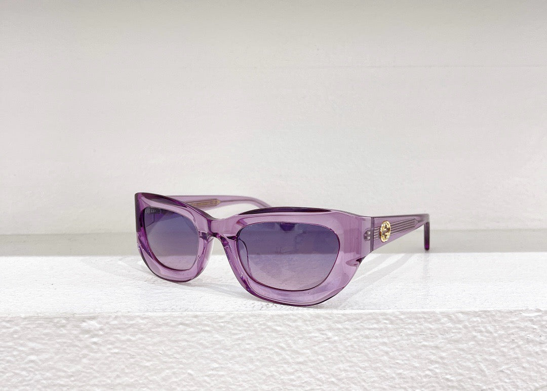 Sonnenbrille in Braun, Schwarz, Blau und Gold