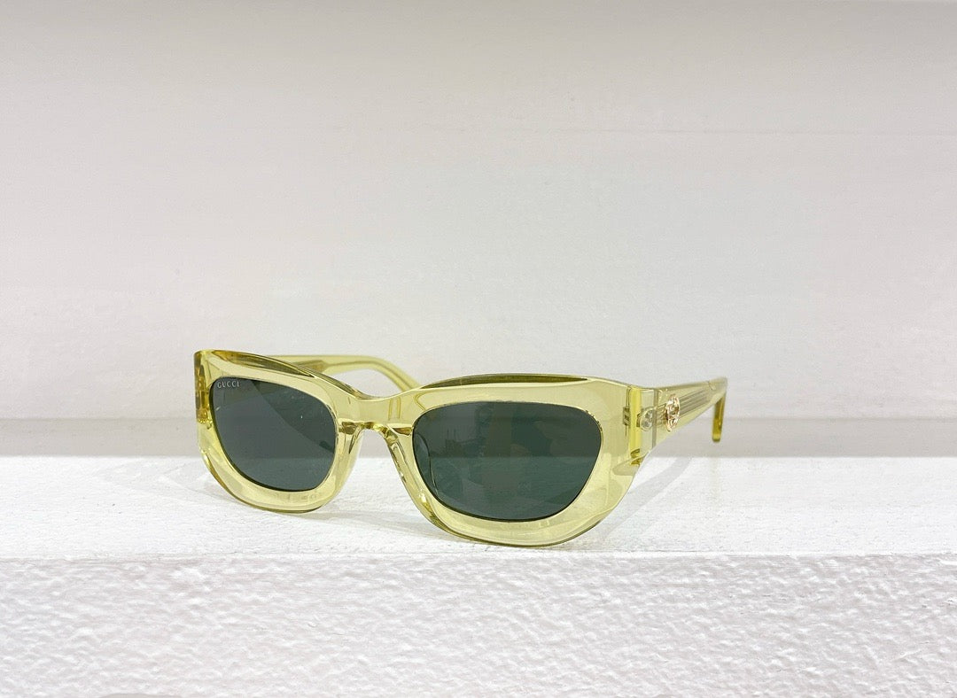 Sonnenbrille in Braun, Schwarz, Blau und Gold
