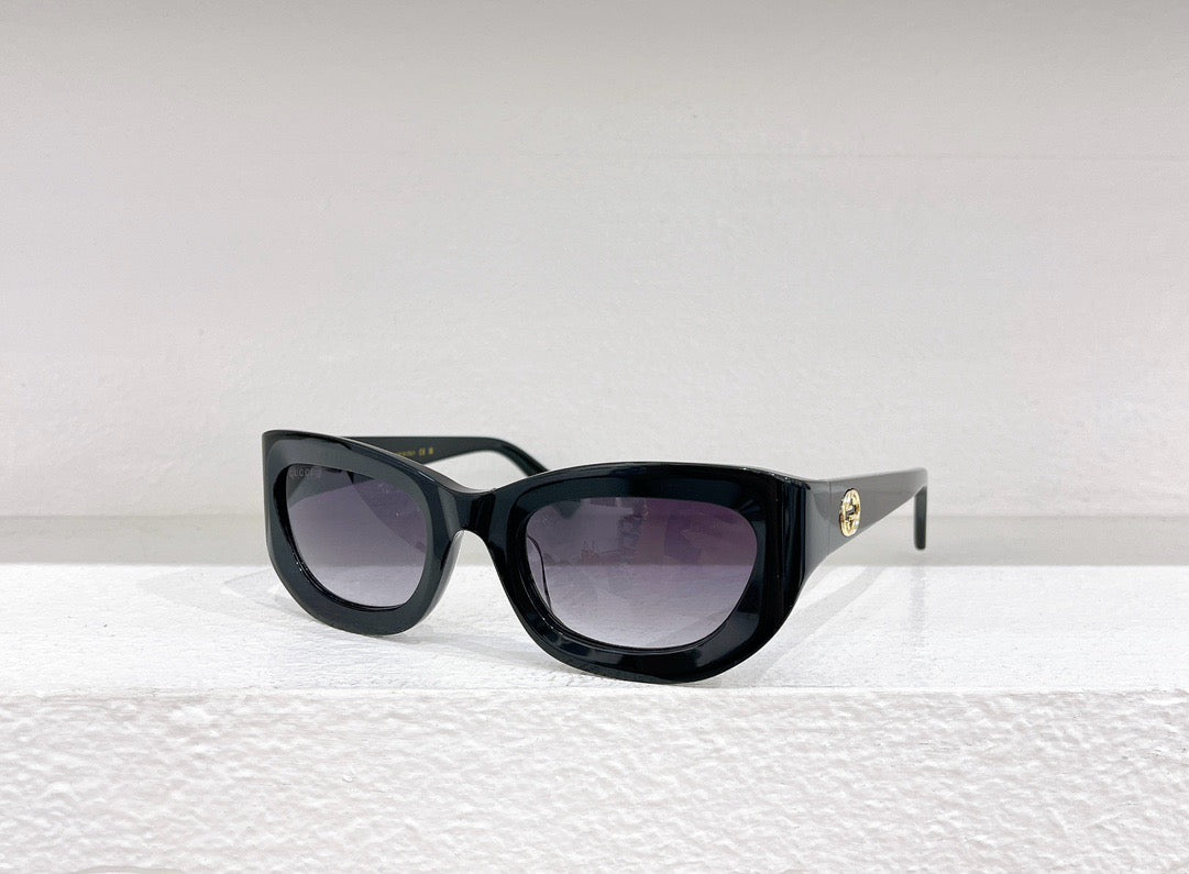 Sonnenbrille in Braun, Schwarz, Blau und Gold