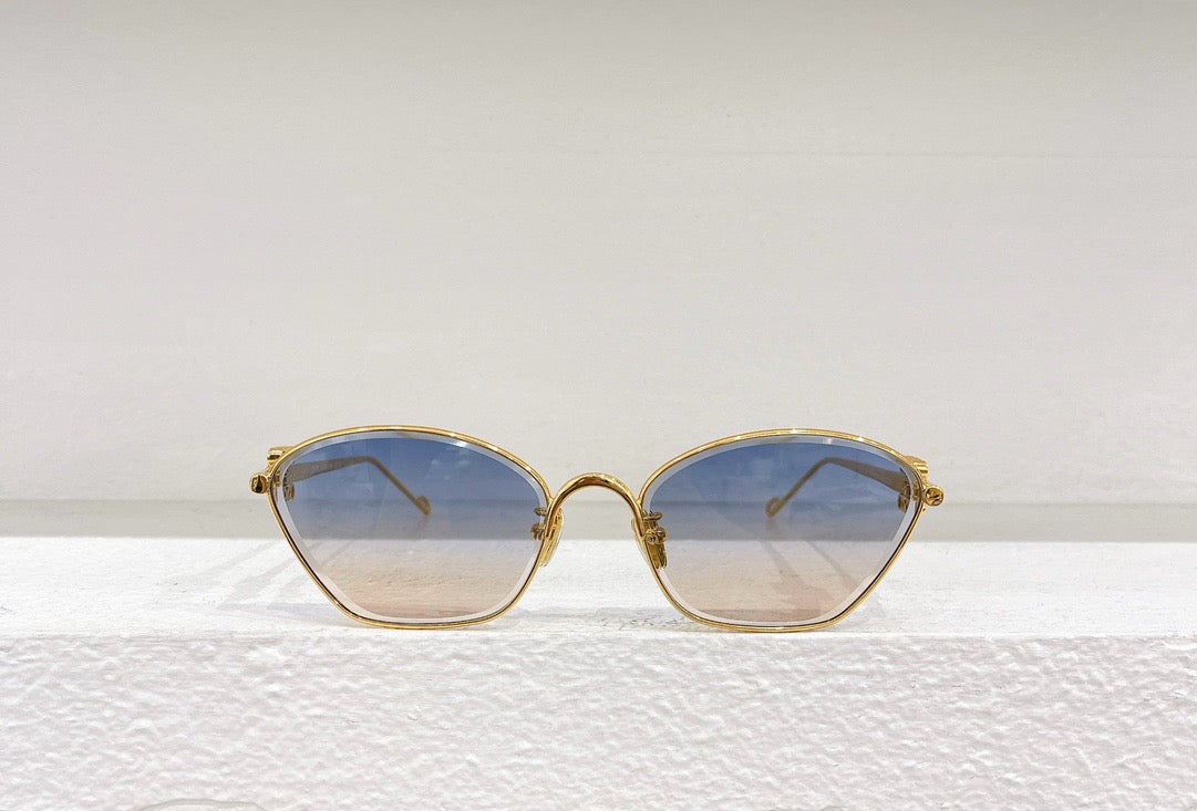 Braune, gelbe, rosa und schwarze Sonnenbrille