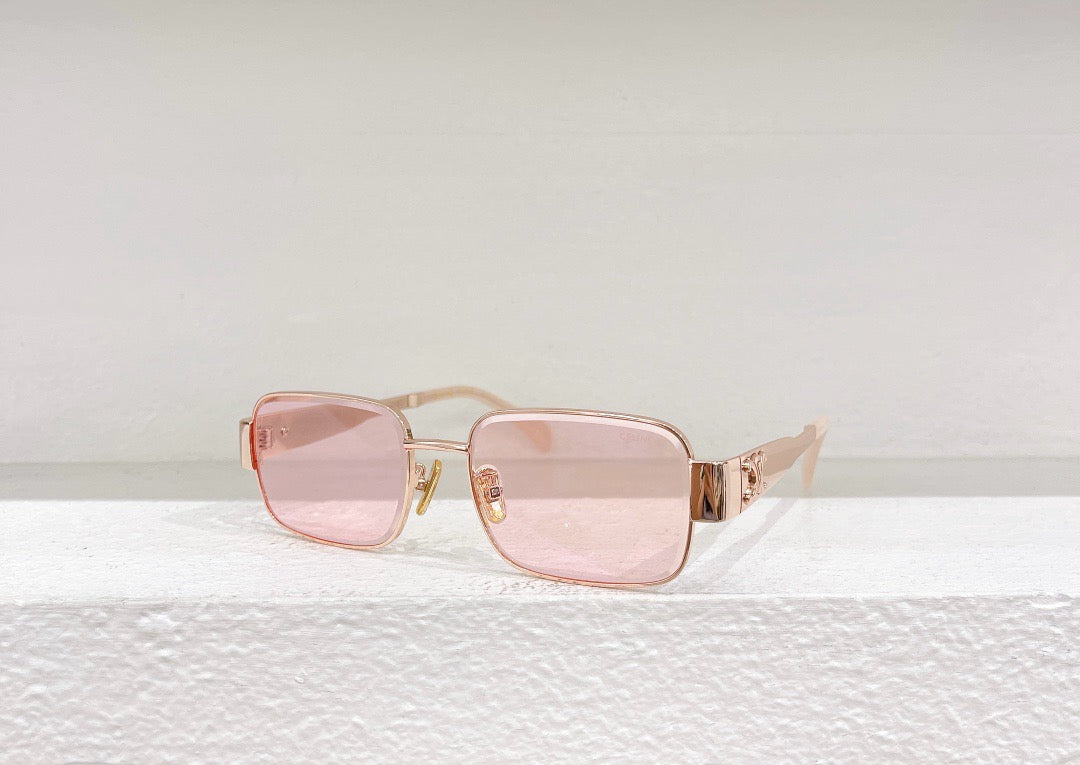 Schwarze, weiße, rosa, grüne und braune Sonnenbrille