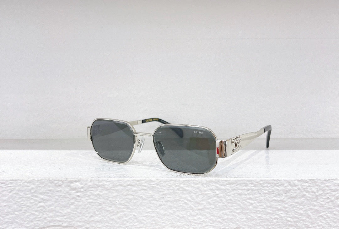 Schwarze, weiße, rosa, grüne und braune Sonnenbrille