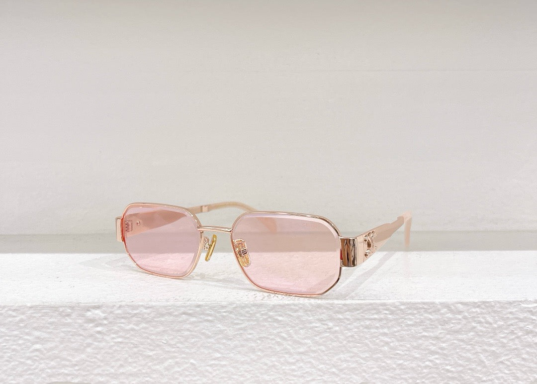 Schwarze, weiße, rosa, grüne und braune Sonnenbrille