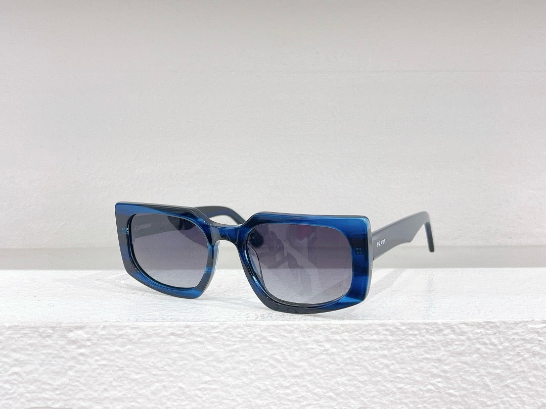 Schwarze, blaue, braune und graue Sonnenbrille