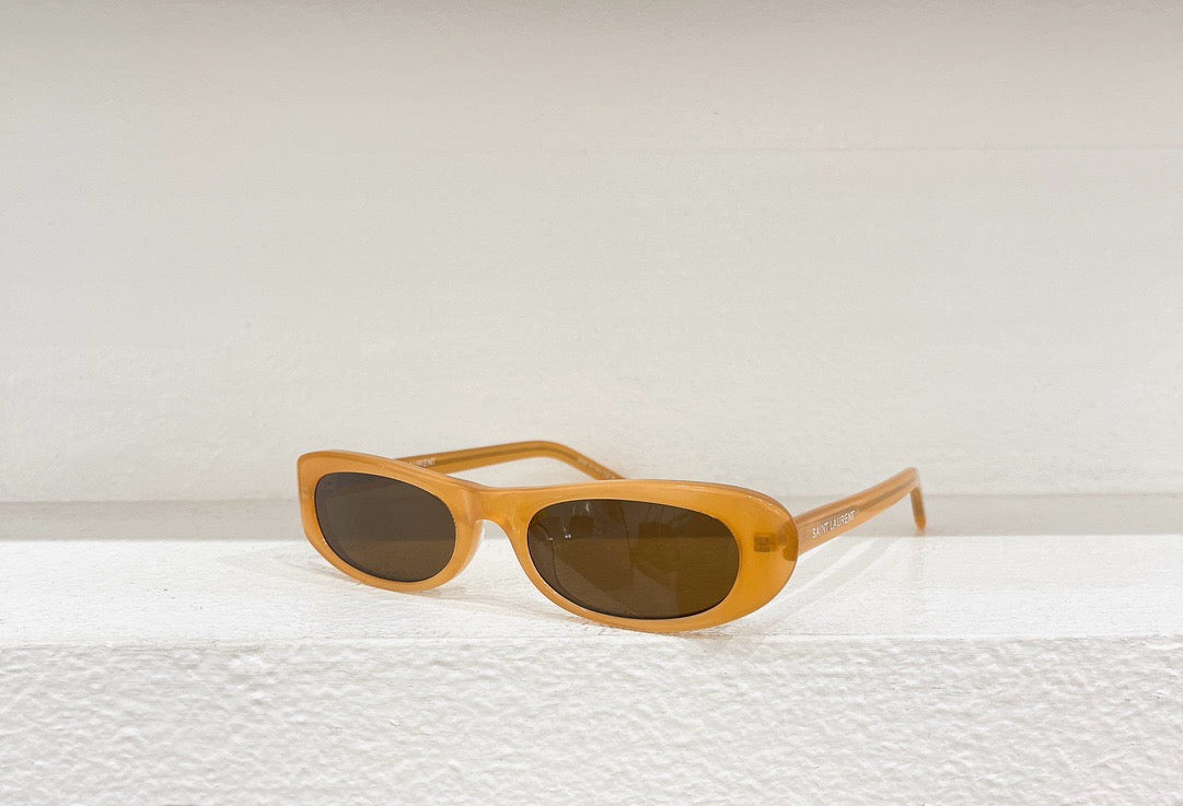 Schwarze, braune und weiße Sonnenbrille