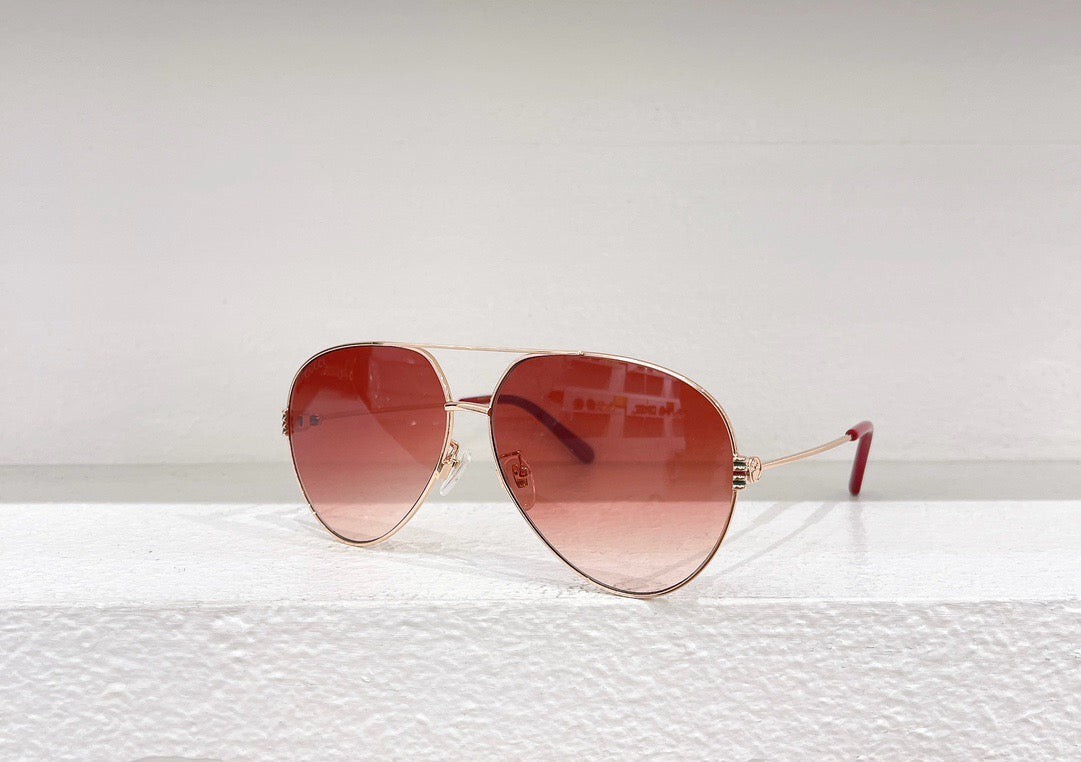 Blaue, rote und braune Sonnenbrille