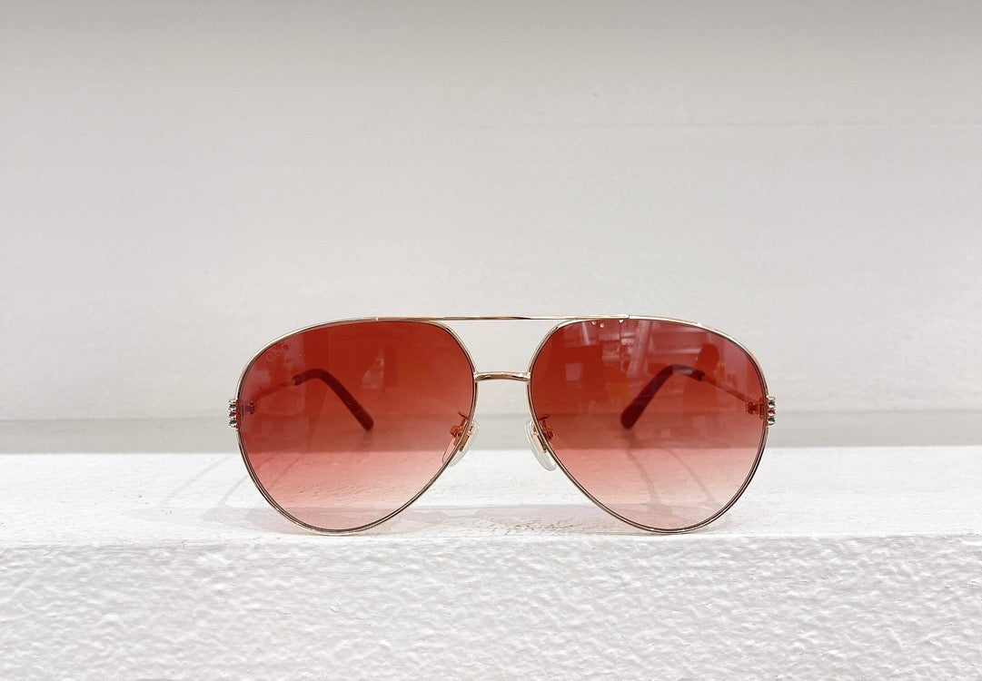 Blaue, rote und braune Sonnenbrille