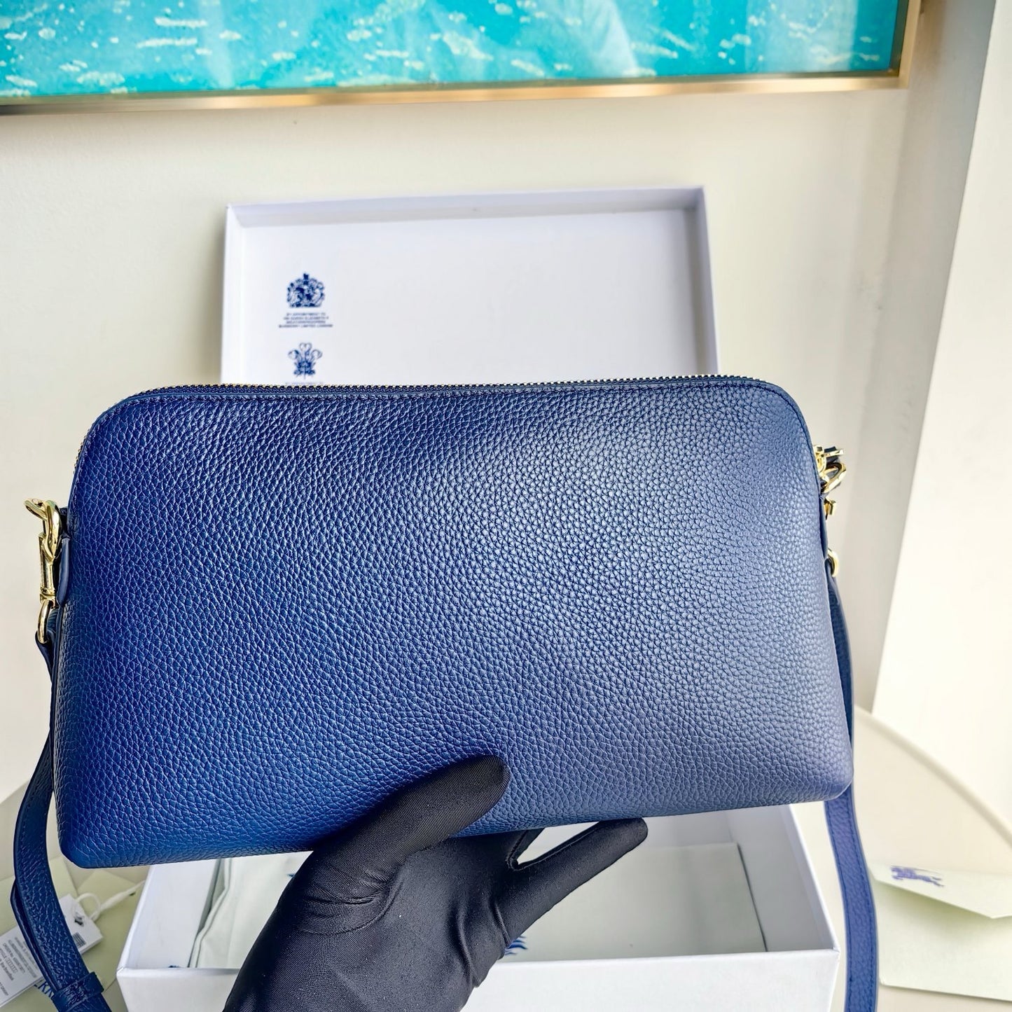 Bolso color caqui, azul y negro