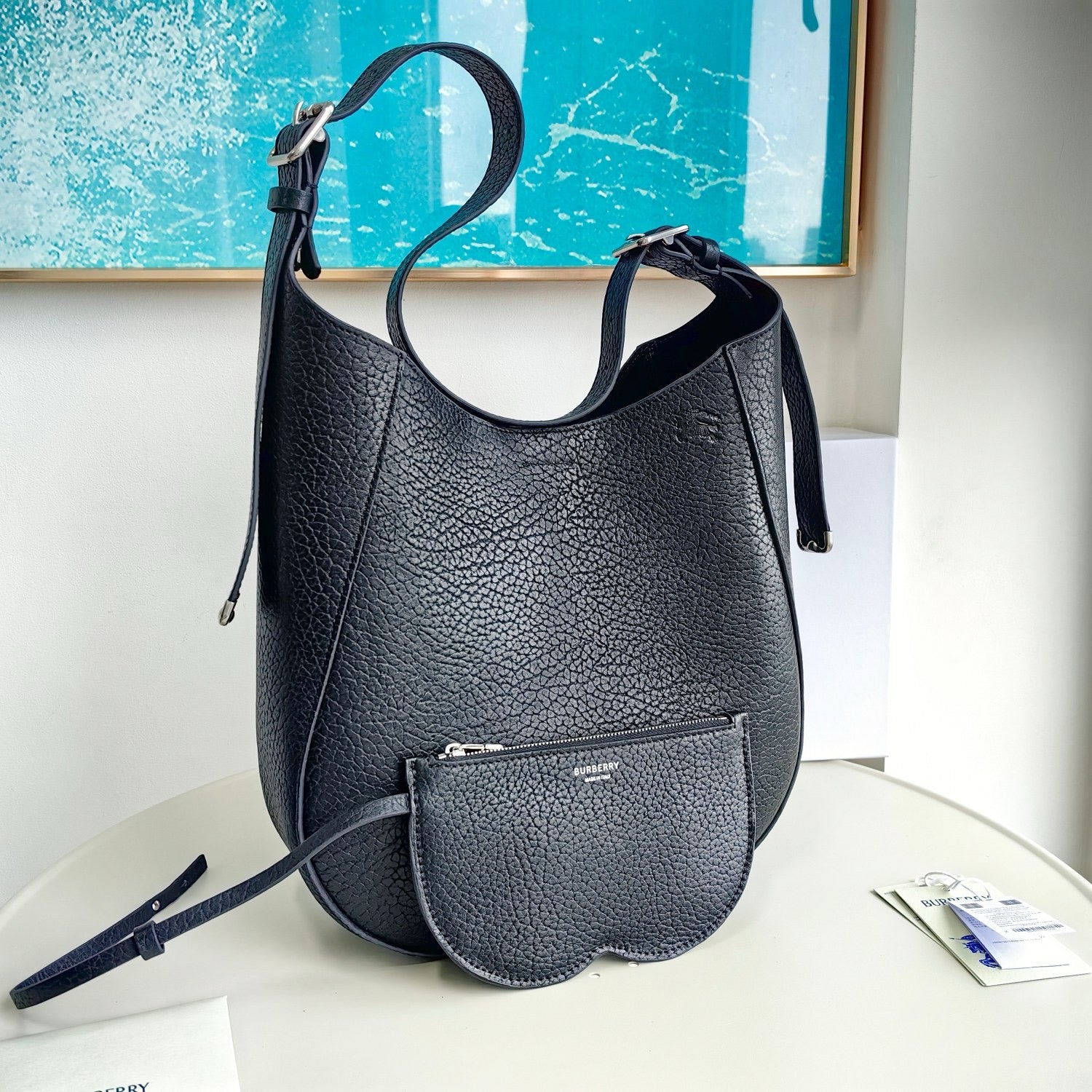 Grüne, khakifarbene und schwarze Tasche