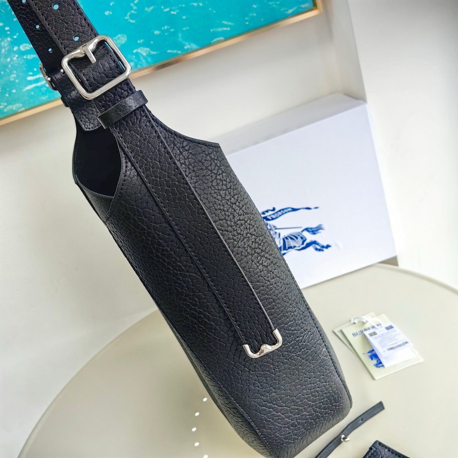 Grüne, khakifarbene und schwarze Tasche