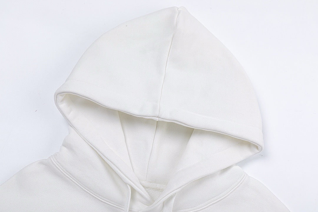 Schwarz-weißer Kapuzenpullover