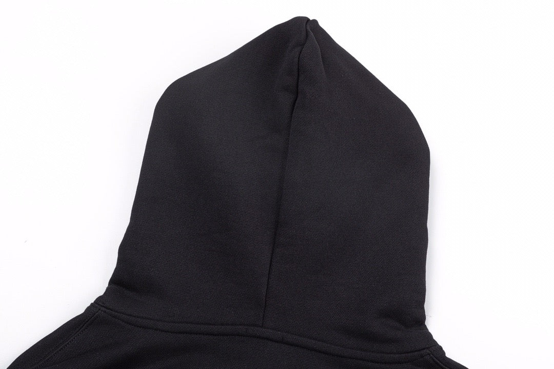 Schwarz-weißer Kapuzenpullover