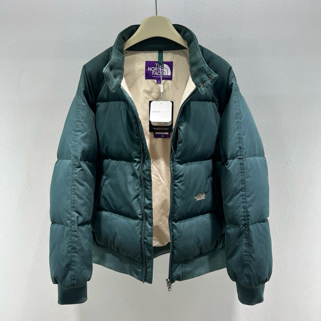 Chaqueta verde, negra y blanca