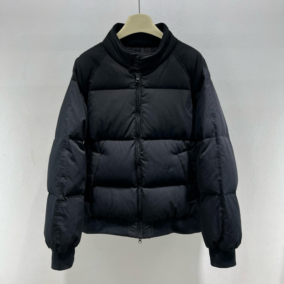 Chaqueta verde, negra y blanca