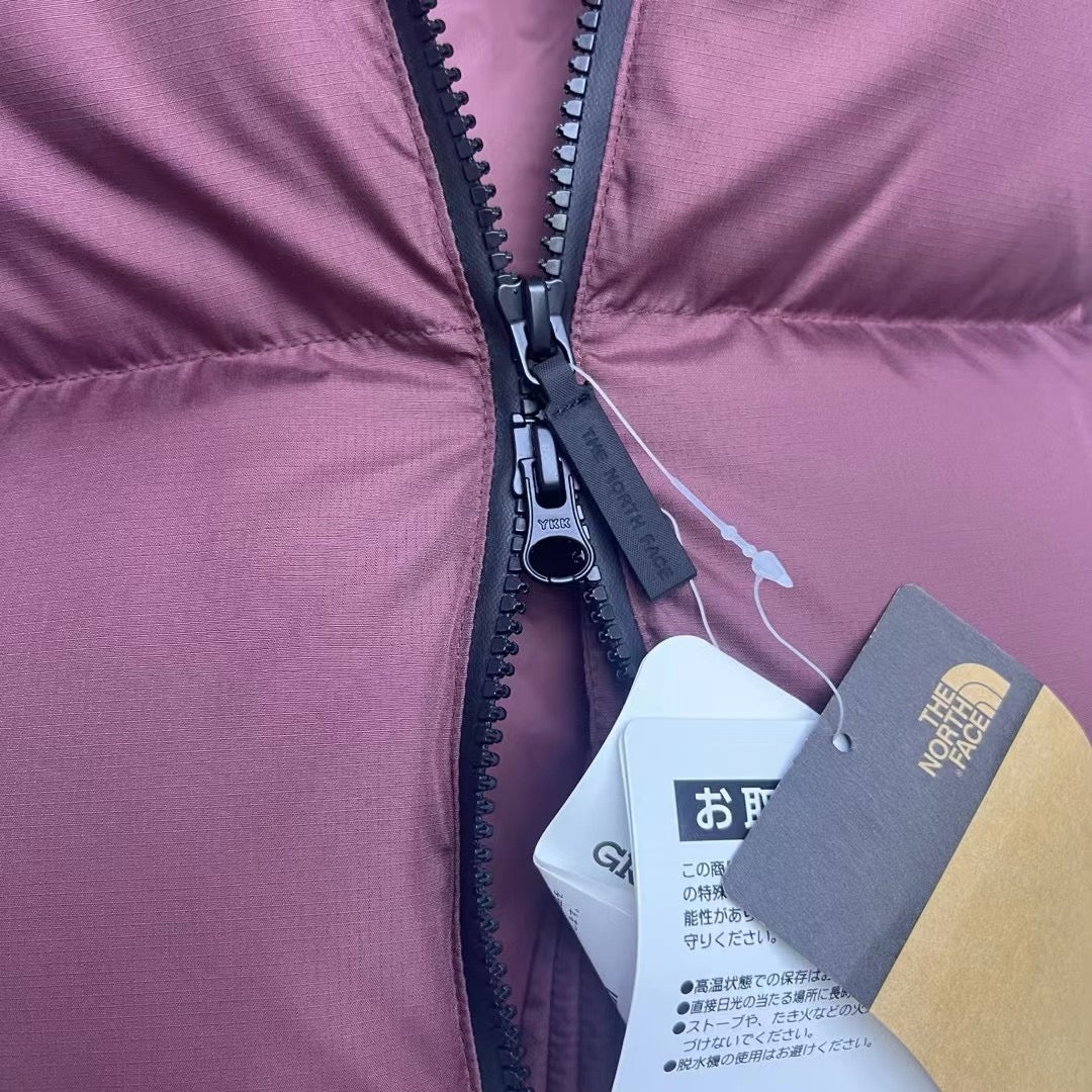 Schwarze, braune und graue Jacke