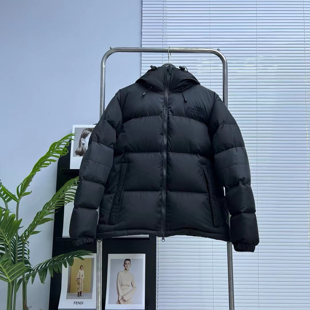 Schwarze, braune und graue Jacke