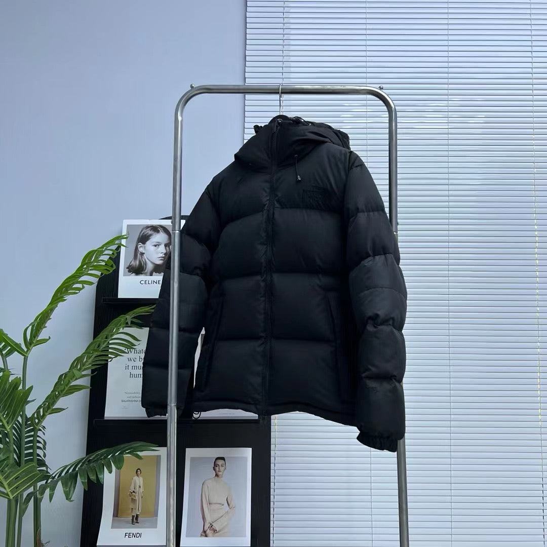 Schwarze, braune und graue Jacke
