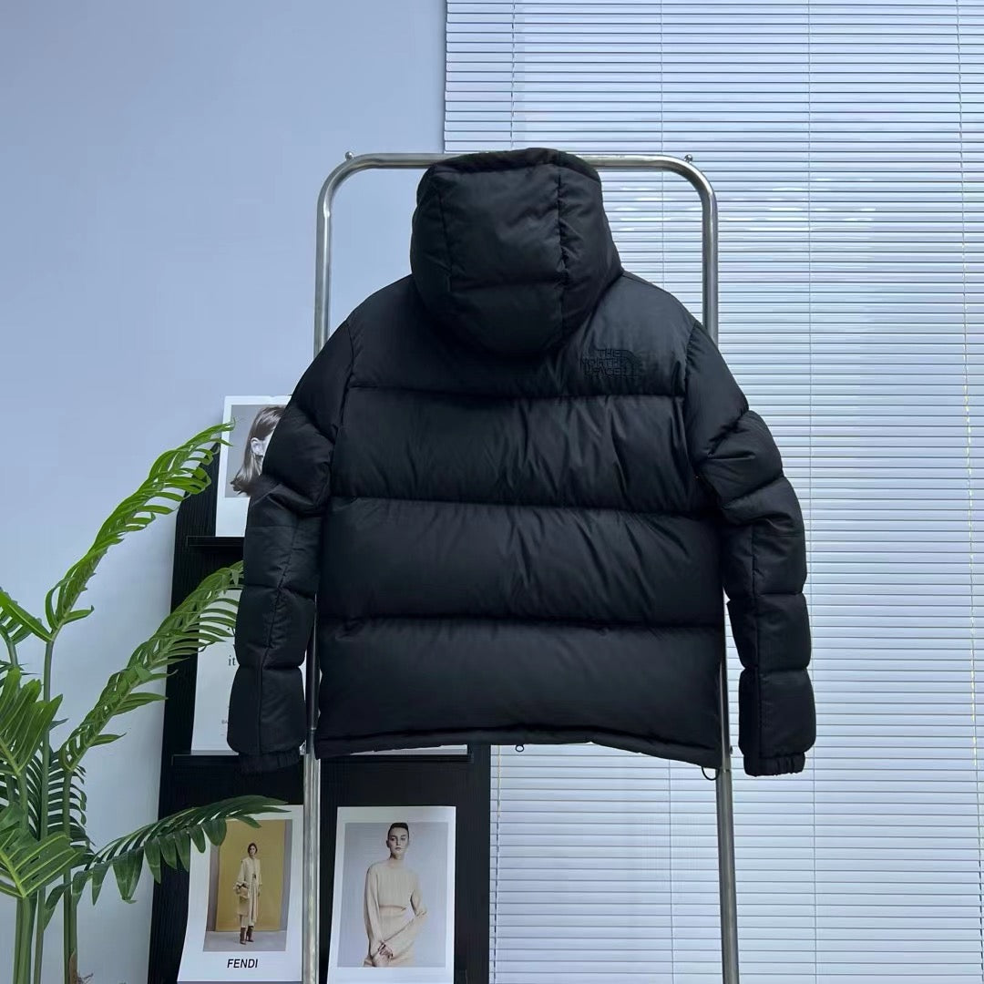 Schwarze, braune und graue Jacke