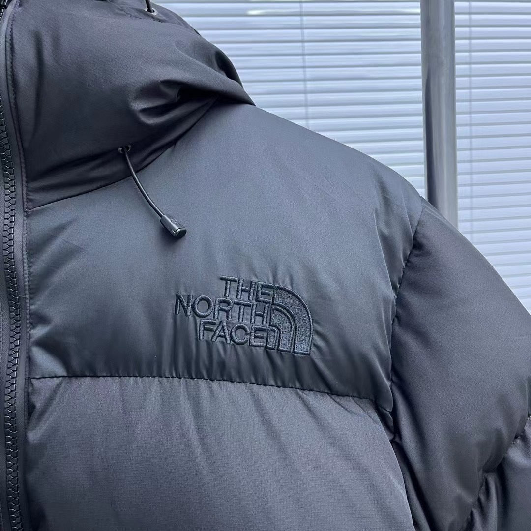 Schwarze, braune und graue Jacke