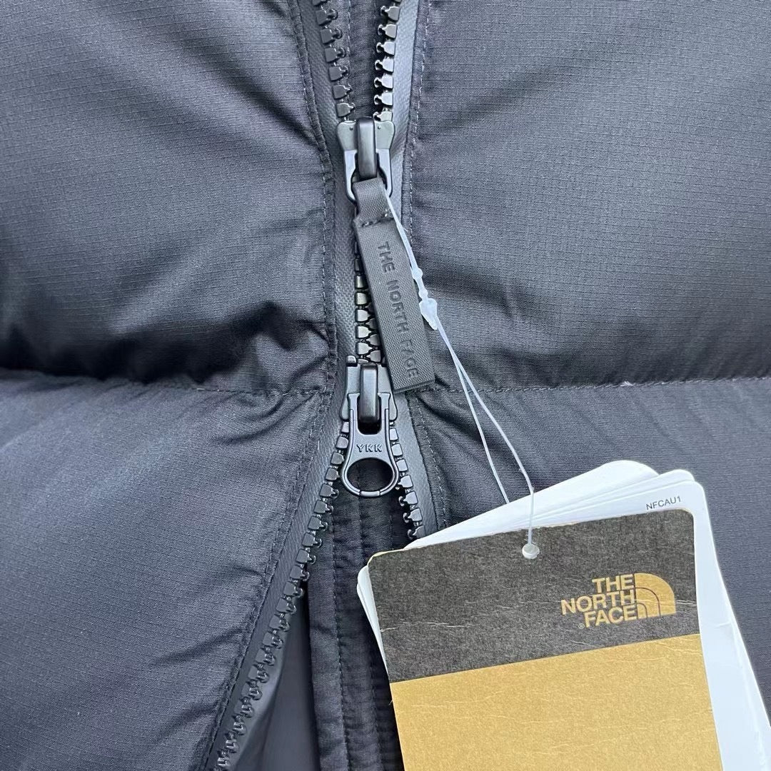 Schwarze, braune und graue Jacke