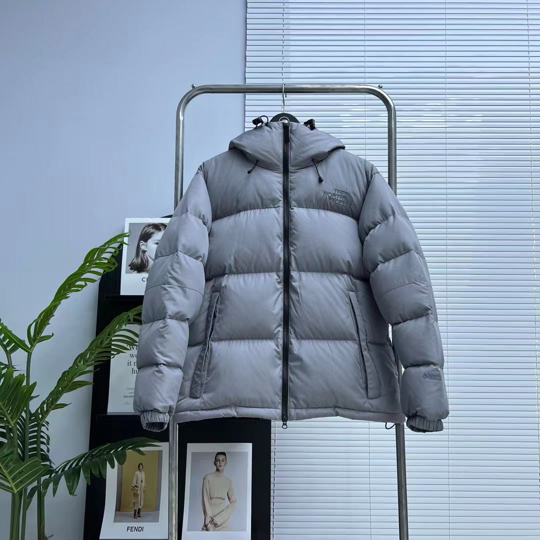 Schwarze, braune und graue Jacke