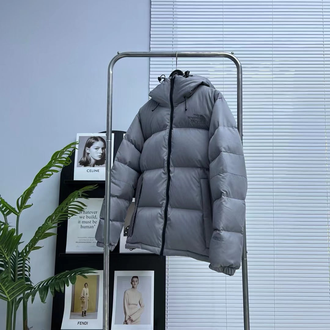 Schwarze, braune und graue Jacke