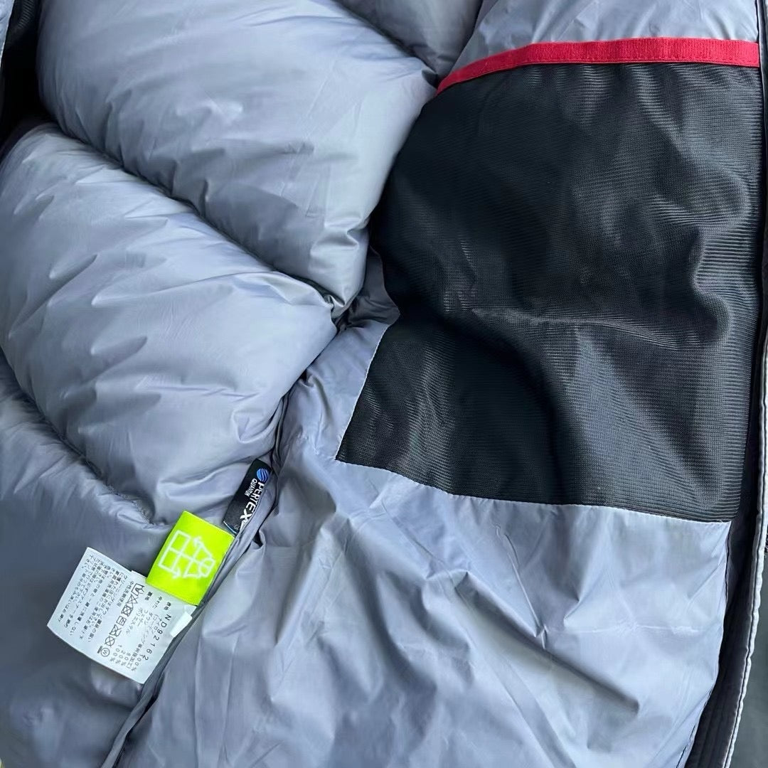 Schwarze, braune und graue Jacke
