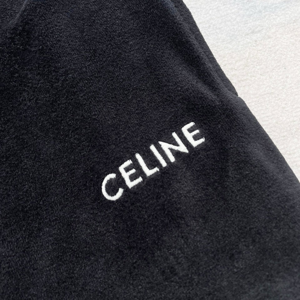 Schwarze und grüne Hose