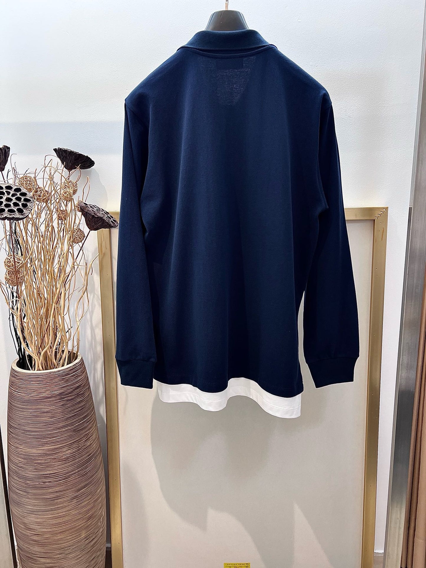 Blaues und braunes Trikot