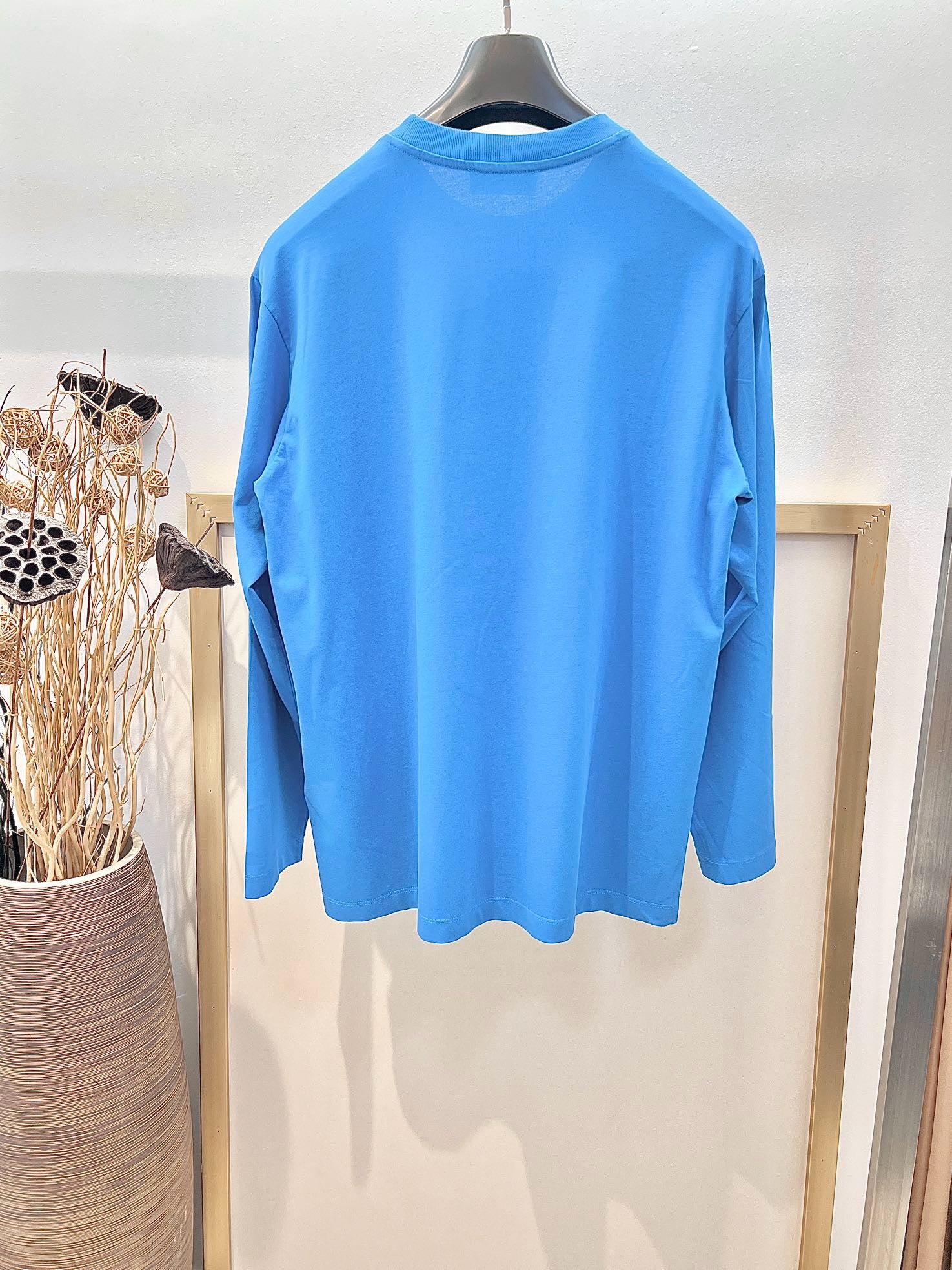 Blaues, weißes und himmelblaues Jersey