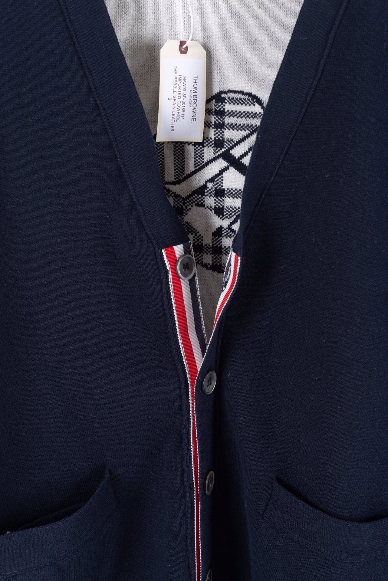 Graue und blaue Jacke