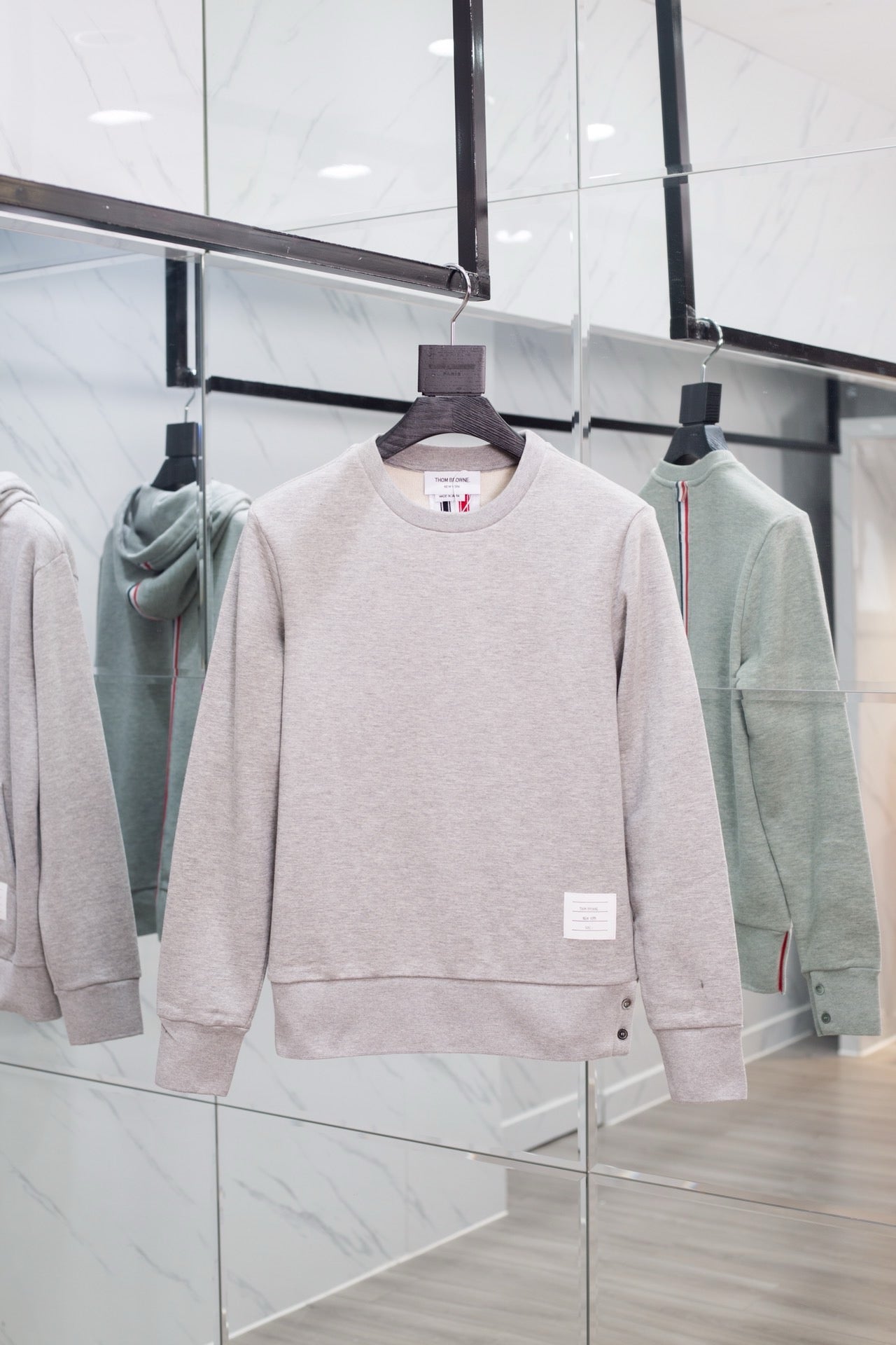 قميص جيرسي أزرق ورمادي