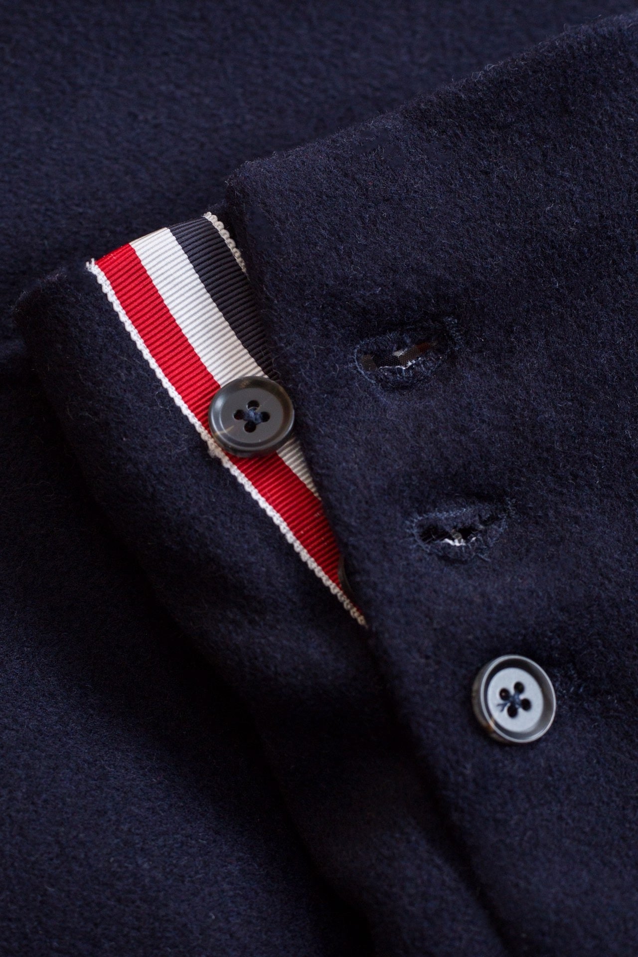 Blaue und graue Jacke