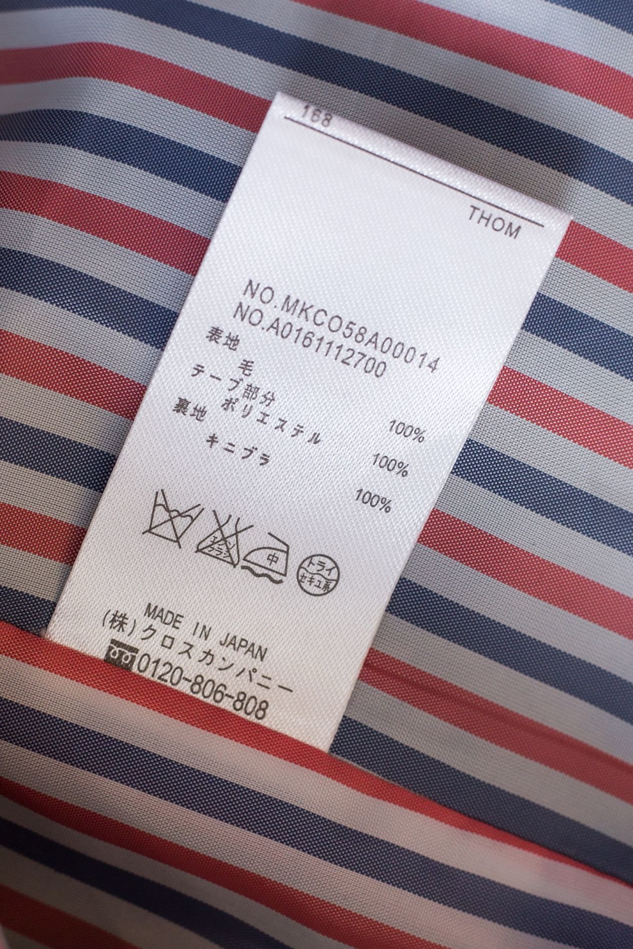 Blaue und graue Jacke