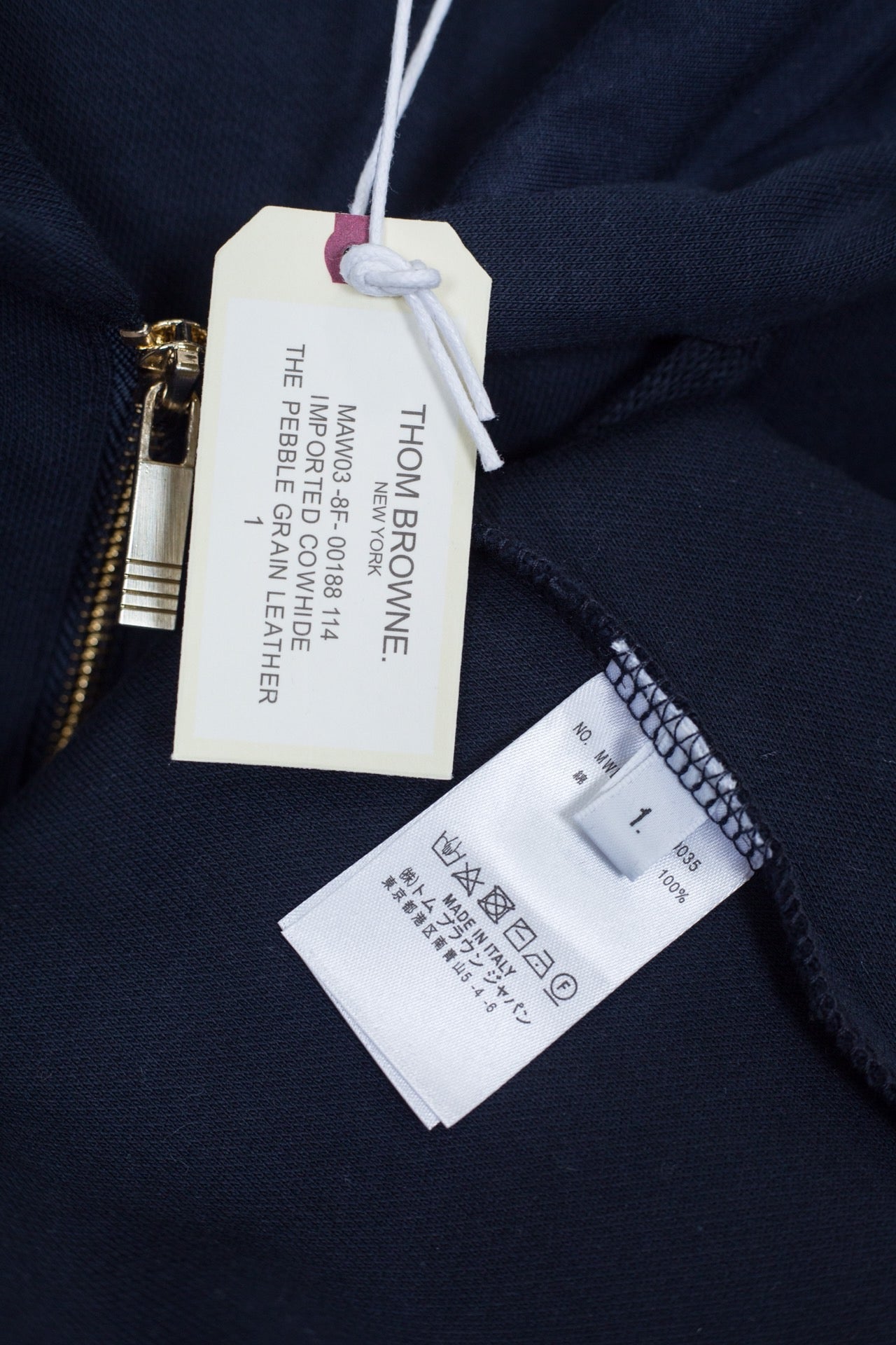 Blaue und graue Jacke